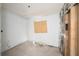 Bedroom with boarded up window, exposed wall studs, and damage to the base of the walls at 4029 13Th S Ave, St Petersburg, FL 33711
