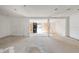 Spacious living room with freshly painted walls and an entry door, awaits renovation and personal touches at 4029 13Th S Ave, St Petersburg, FL 33711