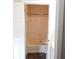 View of the bathtub and shower in a well-lit bathroom with white tile and hardware at 4211 Chatham Oak Ct # 122, Tampa, FL 33624
