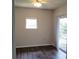 Bright living room offering a cozy atmosphere with access to a balcony at 4211 Chatham Oak Ct # 122, Tampa, FL 33624