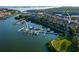Aerial view of waterfront homes with private boat docks and access to a beautiful waterway at 4339 Spinnaker Cove Ln, Tampa, FL 33615