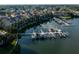 Aerial view of waterfront community featuring private docks, lush landscaping, and serene water views at 4339 Spinnaker Cove Ln, Tampa, FL 33615