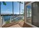 Balcony with a great view of the water and boat dock at 4339 Spinnaker Cove Ln, Tampa, FL 33615
