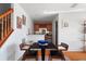 Cozy dining area with a dark table, seating for four, and a charming bar area in the background at 4339 Spinnaker Cove Ln, Tampa, FL 33615