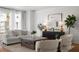 Bright living room features a comfortable couch, stylish furnishings, and lots of natural light at 4339 Spinnaker Cove Ln, Tampa, FL 33615