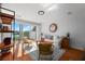Inviting living room with water views, comfortable seating, natural light, and a decorative rug at 4339 Spinnaker Cove Ln, Tampa, FL 33615