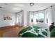 Bright main bedroom with large windows and hardwood flooring at 4339 Spinnaker Cove Ln, Tampa, FL 33615
