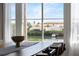 Close-up view of the waterway and waterfront homes from the dining room window at 4339 Spinnaker Cove Ln, Tampa, FL 33615
