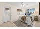 Comfortable bedroom with natural light, tiled floor and a private entrance at 500 86Th N Ave, St Petersburg, FL 33702