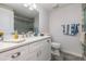 Bright bathroom featuring a tiled floor, a sink with sleek faucet, and modern fixtures at 608 Florida S Cir, Apollo Beach, FL 33572