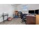 Office with white walls, a window with view and lots of storage space at 608 Florida S Cir, Apollo Beach, FL 33572