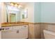 Bathroom with granite countertop vanity and tiled flooring at 7313 Gaberia Rd, Trinity, FL 34655