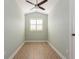 Bedroom with window and ceiling fan at 7313 Gaberia Rd, Trinity, FL 34655