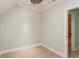 Empty bedroom featuring a ceiling fan and an entrance to an ensuite bathroom at 7313 Gaberia Rd, Trinity, FL 34655