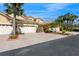 Charming home featuring a three car garage, tile roof, and beautifully landscaped front yard at 7313 Gaberia Rd, Trinity, FL 34655