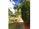 Beautiful walking path in a natural Florida setting with pond and bridge at 7313 Gaberia Rd, Trinity, FL 34655