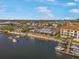 An aerial view of the property's desirable waterfront location with community pool and boat docks at 1026 Bellasol Way # 4403, Apollo Beach, FL 33572