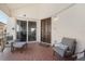 Inviting covered balcony with comfortable seating and tiled flooring at 1026 Bellasol Way # 4403, Apollo Beach, FL 33572