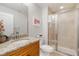 Updated bathroom featuring granite countertops and a walk-in shower at 1026 Bellasol Way # 4403, Apollo Beach, FL 33572