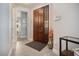 Beautiful entryway with a large front door and tiled floors at 1026 Bellasol Way # 4403, Apollo Beach, FL 33572