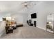 Spacious living room with a ceiling fan and an entertainment area at 1026 Bellasol Way # 4403, Apollo Beach, FL 33572