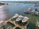Aerial view of a dock and many boats anchored in the water at 1026 Bellasol Way # 4403, Apollo Beach, FL 33572
