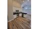 Modern kitchen featuring stainless steel appliances and white cabinetry at 11638 Hidden Hollow Cir, Tampa, FL 33635