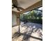 Enjoy indoor-outdoor living in this screened lanai with tile flooring at 11638 Hidden Hollow Cir, Tampa, FL 33635