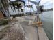 This waterfront property includes a boat lift for easy access to the water at 11697 Grove St, Seminole, FL 33772