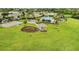 Community recreation area featuring a swimming pool, basketball court, a picnic pavilion and lush landscaping at 13235 Graham Yarden Dr, Riverview, FL 33579