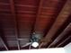 Classic ceiling with wooden panels and a leaf-design ceiling fan at 14034 Marguerite Dr, Madeira Beach, FL 33708