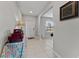 Bright entryway with a view of the front door and adjacent living area at 1454 Tahitian Sunrise Dr, Plant City, FL 33565