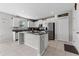 Modern kitchen with granite countertops, stainless steel appliances, and a pantry at 1454 Tahitian Sunrise Dr, Plant City, FL 33565