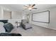 Upstairs loft featuring neutral carpeting and a large projection screen for entertaining at 1454 Tahitian Sunrise Dr, Plant City, FL 33565