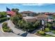 Beautiful gated entrance with the American flag waving, lush greenery and colorful foliage at 15 Jefferson S Ct, St Petersburg, FL 33711