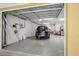 The spacious garage has clean, sealed floors and lots of additional storage at 15 Jefferson S Ct, St Petersburg, FL 33711