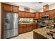 Well-equipped kitchen features granite countertops, modern appliances, and plenty of storage at 15 Jefferson S Ct, St Petersburg, FL 33711