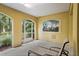 The patio is a nice area for relaxation with beautiful artwork at 15 Jefferson S Ct, St Petersburg, FL 33711