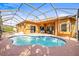 Sparkling swimming pool area with patio at 16410 Ivy Lake Dr, Odessa, FL 33556