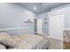 Bedroom with carpet, and closet, light blue walls, with shelves at 16410 Ivy Lake Dr, Odessa, FL 33556