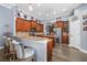 Gourmet kitchen boasts custom cabinets, granite countertops, and stainless steel appliances at 16410 Ivy Lake Dr, Odessa, FL 33556