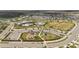 A complete view of the community amenities including the pool, playground, and parking, perfect for active living at 16549 Secret Meadow Dr, Odessa, FL 33556