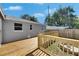 Picture of the deck, privacy fence and backyard of the home at 1940 N Betty Ln, Clearwater, FL 33755