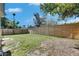 Large backyard with a privacy fence and lush green grass at 1940 N Betty Ln, Clearwater, FL 33755