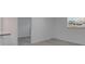 Bedroom with wood-look floors, and natural light; a calm and inviting space for rest and relaxation at 1940 N Betty Ln, Clearwater, FL 33755