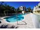 Sparkling community swimming pool with clear blue water and ample deck space at 19651 Gulf Blvd # A11, Indian Shores, FL 33785