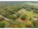 Beautiful aerial view of the property with lush greenery and a peaceful atmosphere at 226 Benes Rd, Brooksville, FL 34604