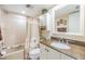 Bathroom featuring a granite countertop vanity, tiled walls, and a shower-tub combination at 2549 Royal Pines Cir # 16H, Clearwater, FL 33763