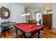 Entertaining game room boasts a billiard table and a classic design, perfect for leisure and social gatherings at 2966 Eagle Estates W Cir, Clearwater, FL 33761