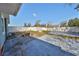 Fenced backyard featuring a stone table and ample concrete patio space at 3127 W Lambright St # A, Tampa, FL 33614